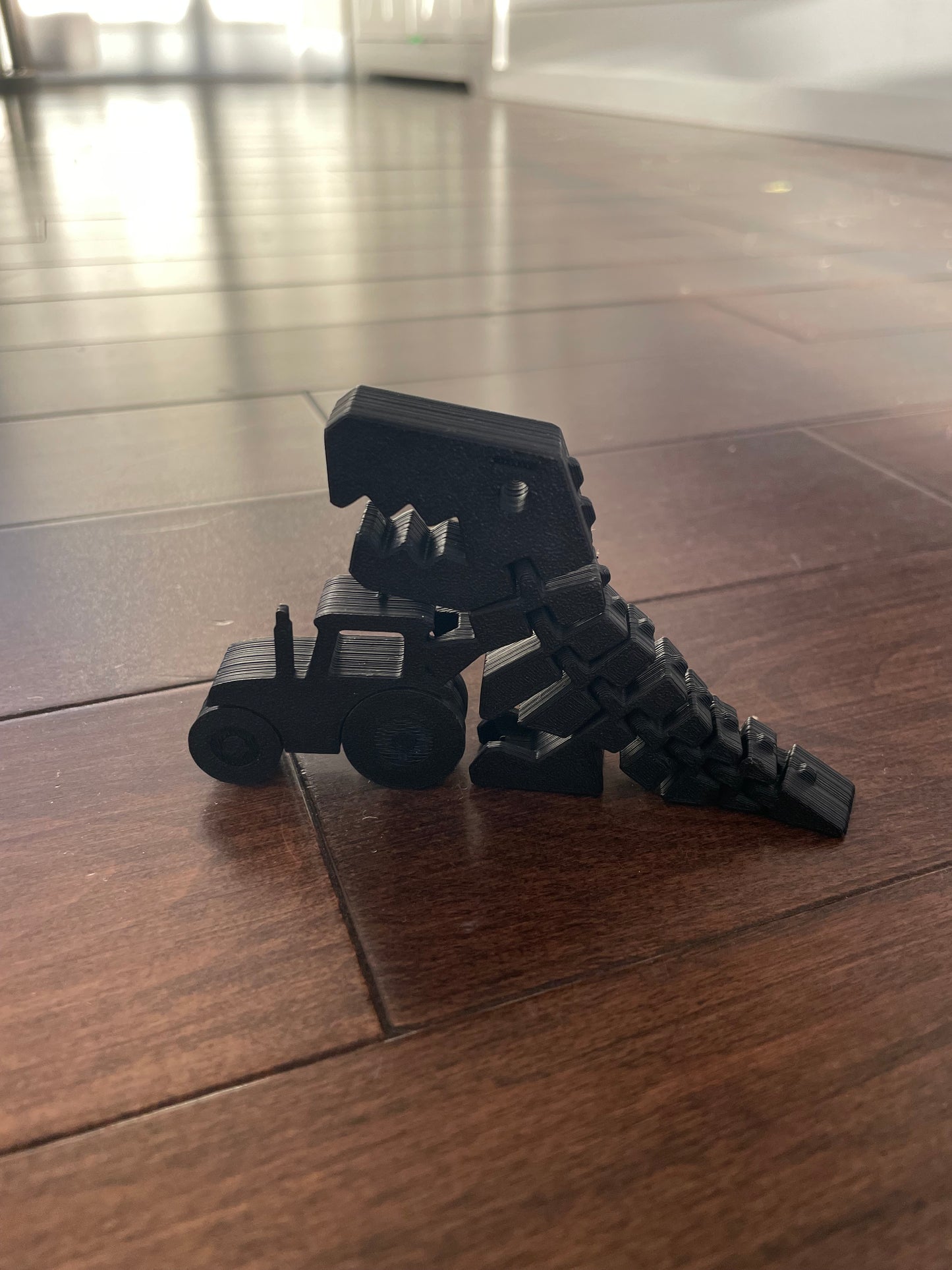 4” Tractor dinosaur.