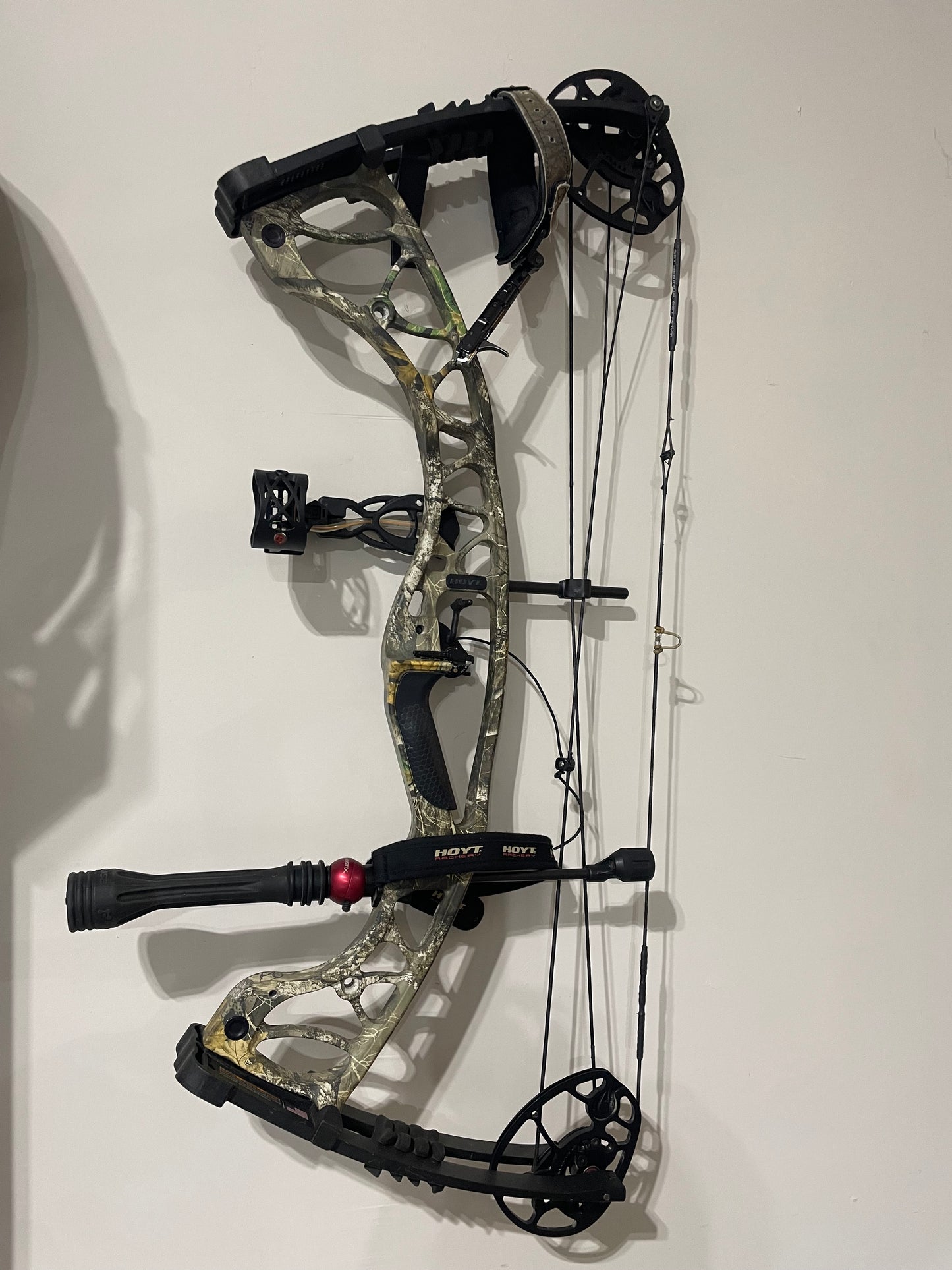 Wall hook for helmets, bows, gear & more.