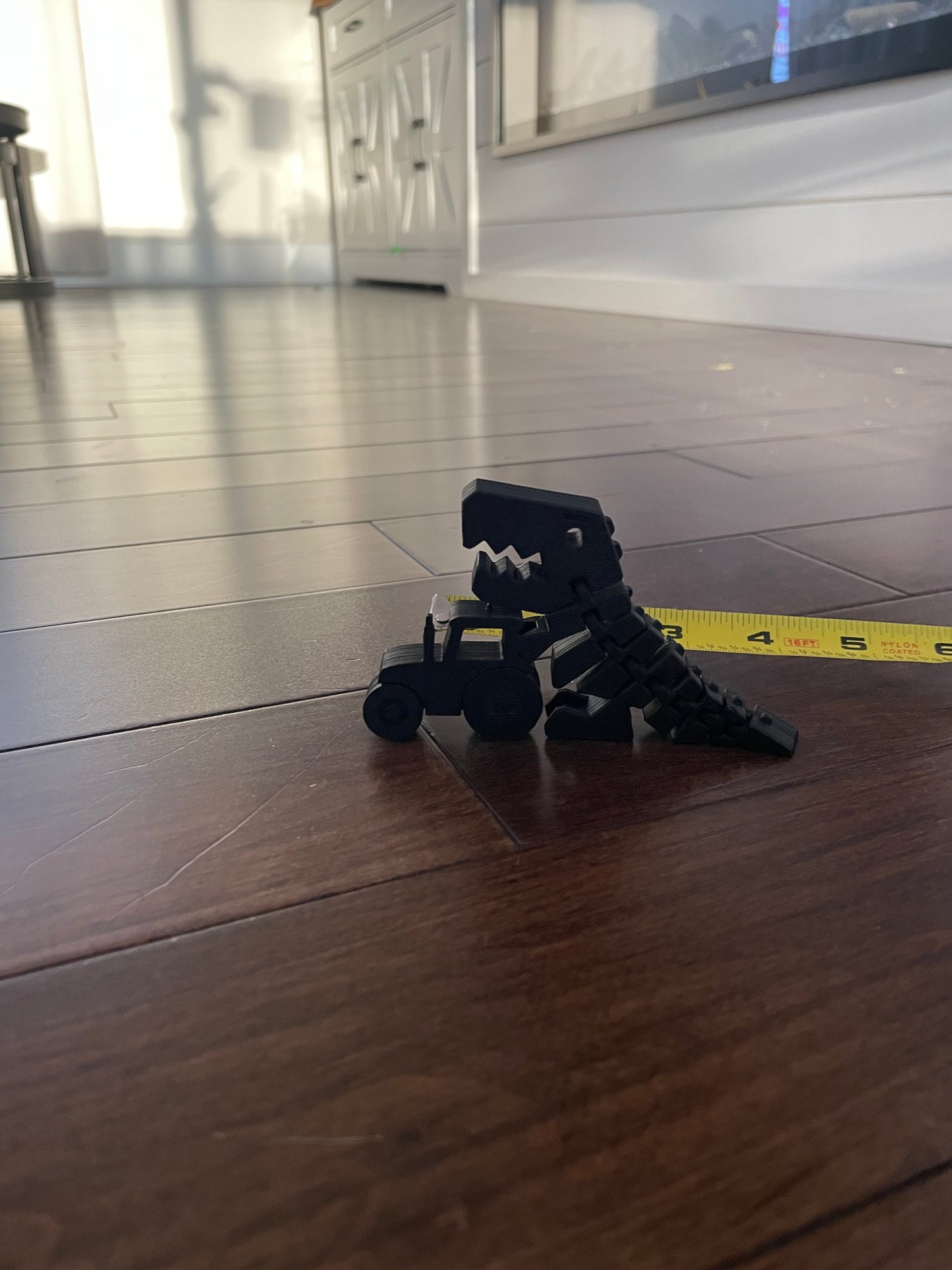 4” Tractor dinosaur.